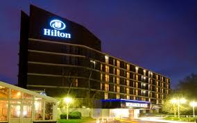 CHALLENGES IN THE BUSINESS ENVIRONMENT about Hilton Hotels